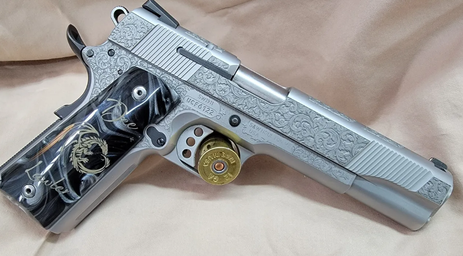 A laser engraver precisely etches intricate designs onto the metal surface of a gun, emitting a bright beam of light as it works